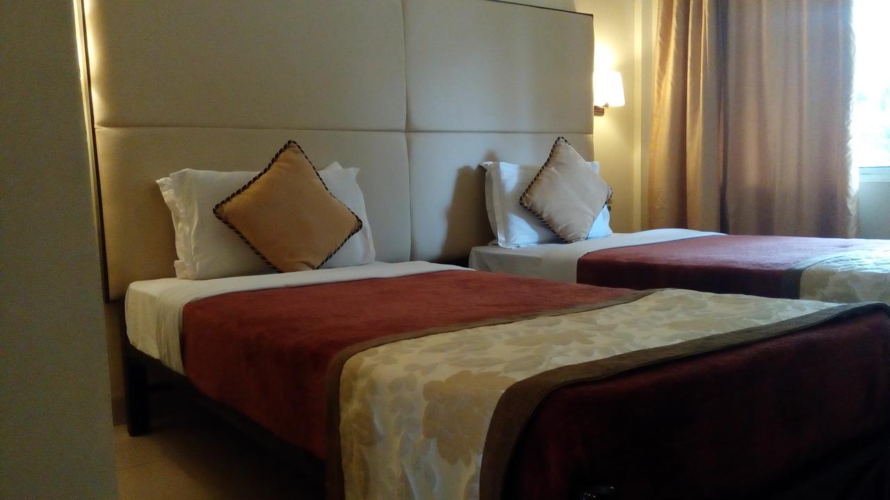 Landmark Hotels Гувахати Экстерьер фото